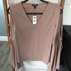Express bell sleeve top